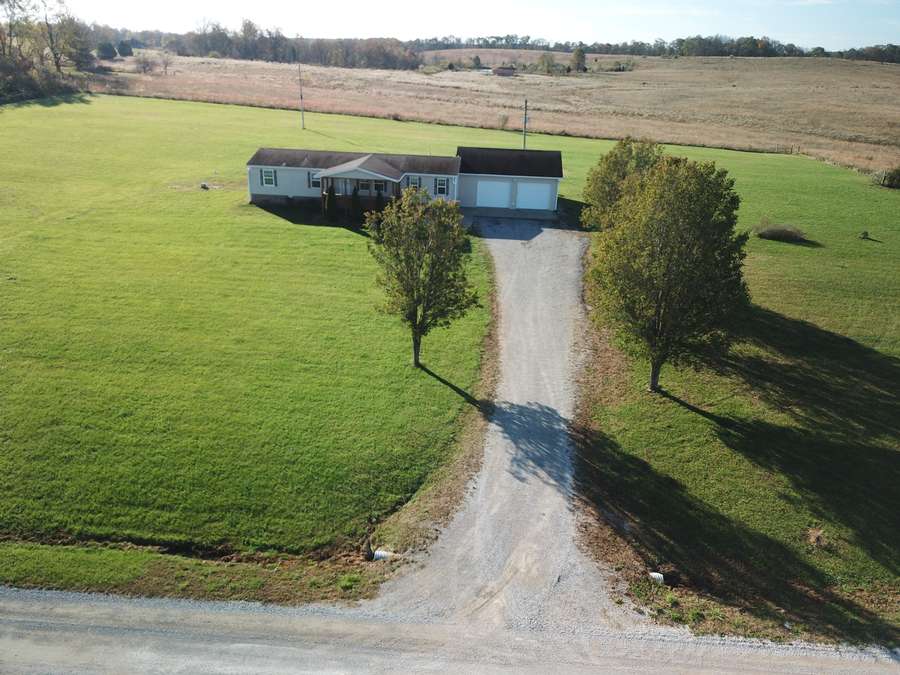 NEW PRICE!  Country Home on 4 Acres +/-